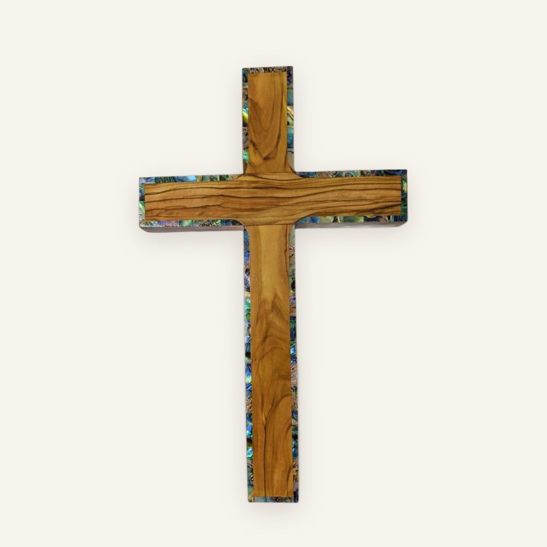 Schlichtes Wandkreuz aus Olivenholz mit Perlmutt-Rand Schlichtes Wandkreuz aus Olivenholz mit Perlmutt-Rand